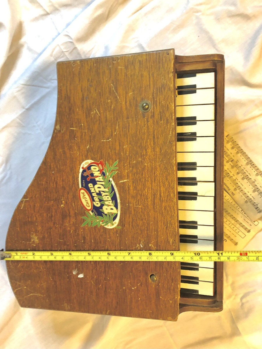 Antique “Cur Pet Baby Grand Piano” - 15 Numbered & Covered Wood