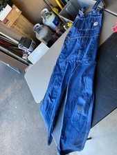 Pre-owned Carhartt R07-DST blue denim bib overalls 36x34   stain on lower legs