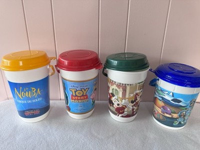Lot of 4 Disney popcorn bucket, Epcot, Happy Holidays, Toy Story, La Nouba