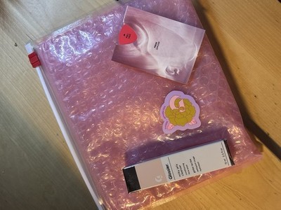 Glossier skincare bag with Milky Jelly Cleanser Mini , Sephoria Sticker & sample