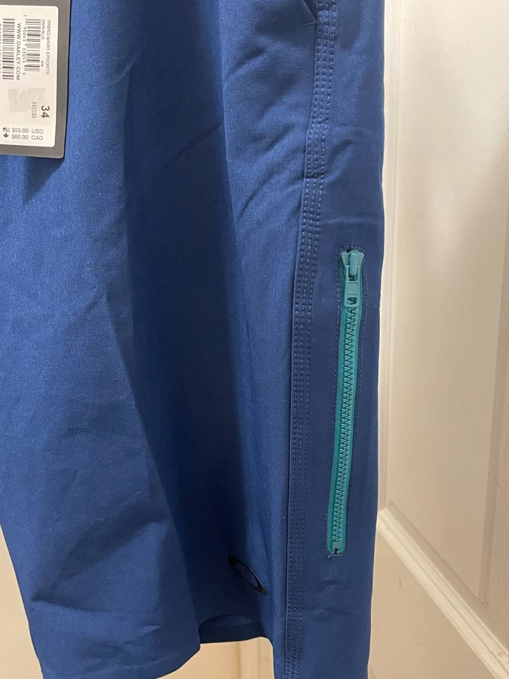 Pantalones Cortos Híbridos Oakley Para Hombre Frente Plano 5 Bolsillos Azul Oscuro 442533 Talla 34 S315 Foto 3 de 4