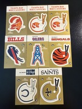 8 NFL team logo stickers. 1982 schedule on back.