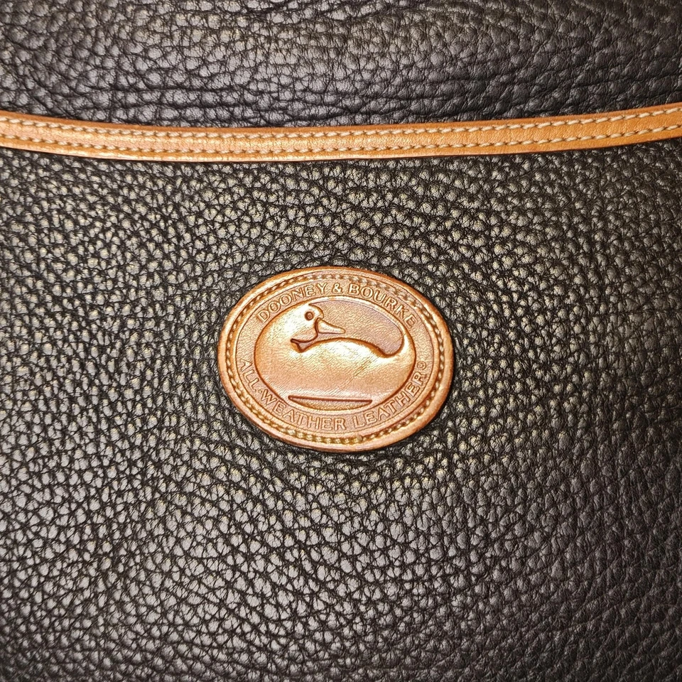 Maletín de cuero vintage Dooney & Bourke para todo tipo de clima negro tostado ribete mensajero Foto 2 de 4