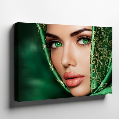 Close-Up Portrait of Woman with Green Eyes and Ornate Silk Headscarf Canvas