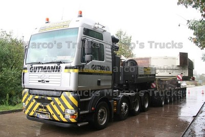LKW Foto MAN TGA Schwerlasttransporter Deutschland silver GUTMANN BigMove #m9ye