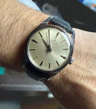 A mid-century Zenith Automatic dress watch, 1958