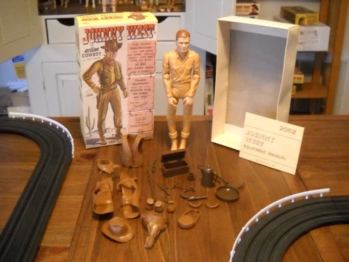 VINTAGE MARX 1RST EDITION ACTION JOHNNY WEST. ACCESSORIES,MANUALS,BOX 1965.