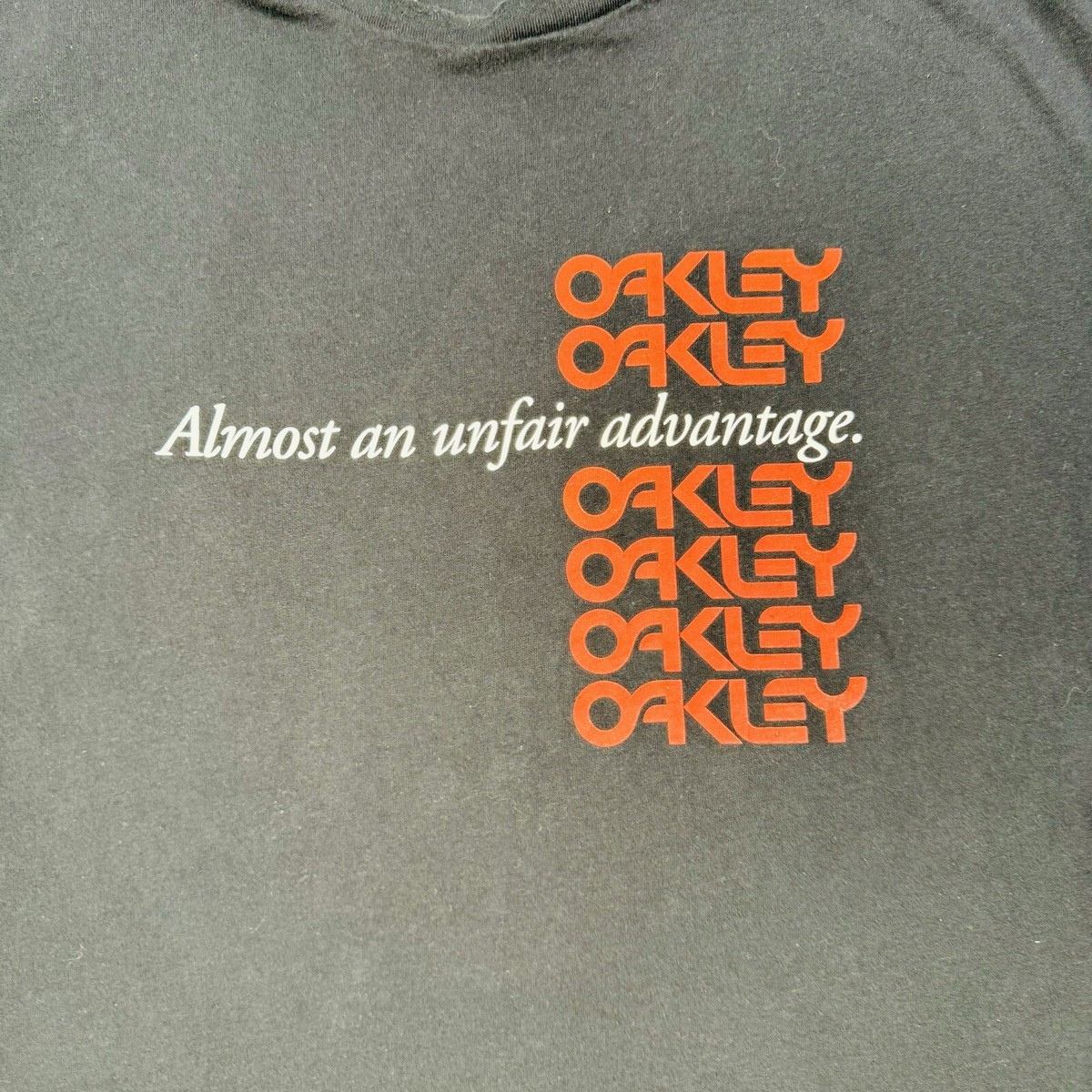 Oakley シャツ 青 ALMOST AN UNFAIR ADVANTAGE 🚨RETRO Oakley Blue T-Shirt 'Almost an Unfair Advantage