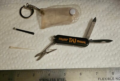 TRUMP TAJ MAHAL PEN KNIFE WITH KEY CHAIN COVER.  MINT  SEE DESCRIPTION