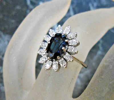 Bague or blanc 18K sertie d un saphir et 14 diamants poincon aigle T 47 - Photo 1/4