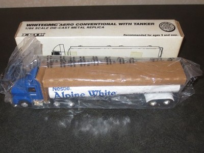 ERTL 1/64 WHITEGMC SEMI TRUCK #9347 NESTLE ALPINE WHITE CHOCOLATE TANKER - MIB