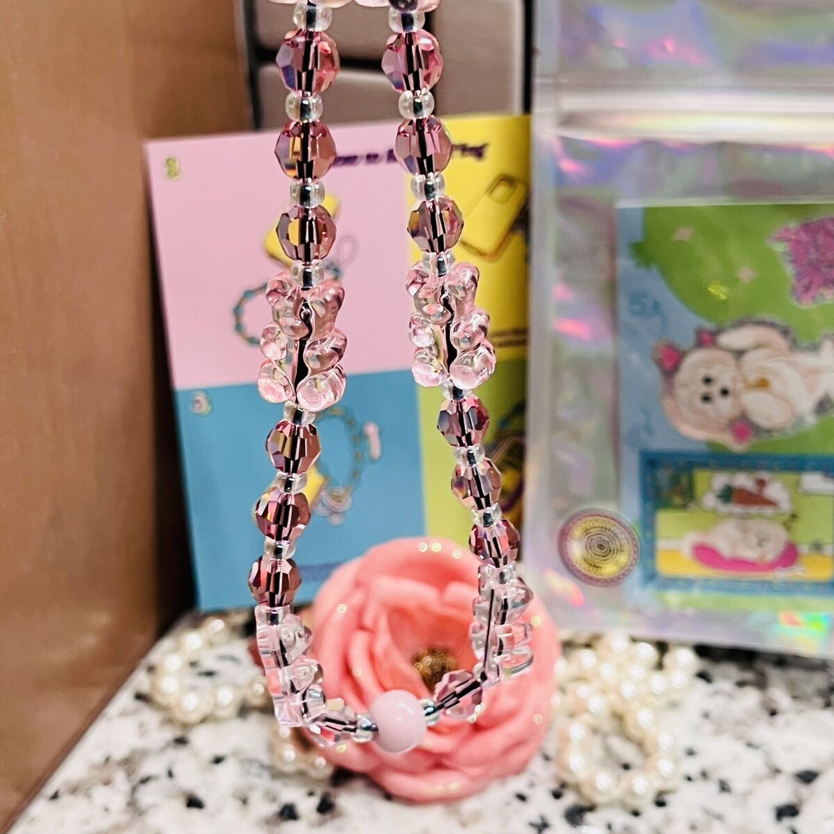 String Ting London Bear-y Rose Drip Crystal Wristlet Phone String Ting London Bear-y Rose Drip Crystal Wristlet Phone