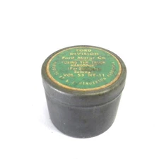VINTAGE FORD DIVIDION FILM TIN CONTAINER "USING THE TRUNK HANDBOOK" TIN EMPTY 