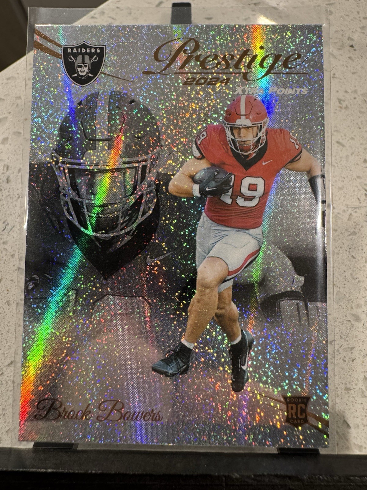 2024 Panini Prestige - Rookies Brock Bowers #305 Xtra Points Galaxy (RC)
