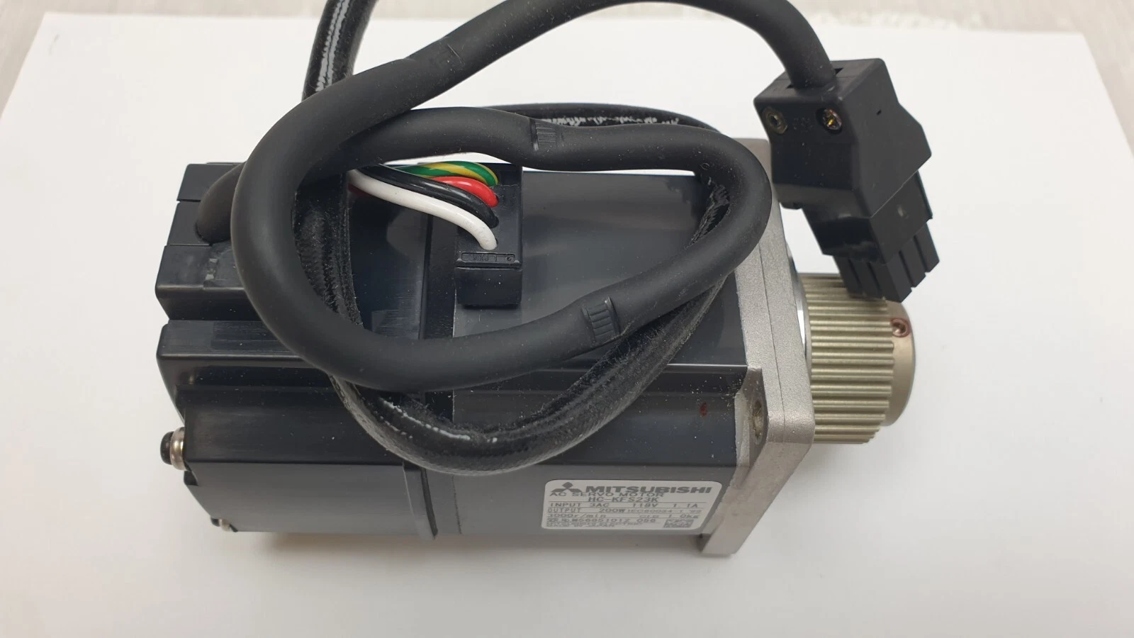 HC-KFS23K motor top with power and encoder cable loops and connectors