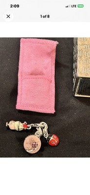 Juicy couture set of three charms With empty perfume bottle