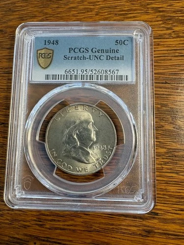 1948 Franklin half dollar PCGS genuine scratch UNC detail.
