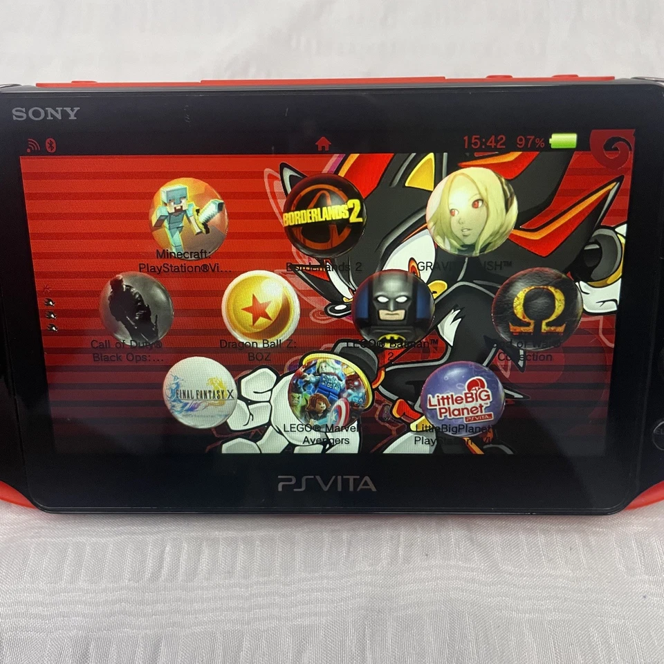 Consola PS Vita -2000 color rojo y negro manera con juegos instalados Foto 3 de 4