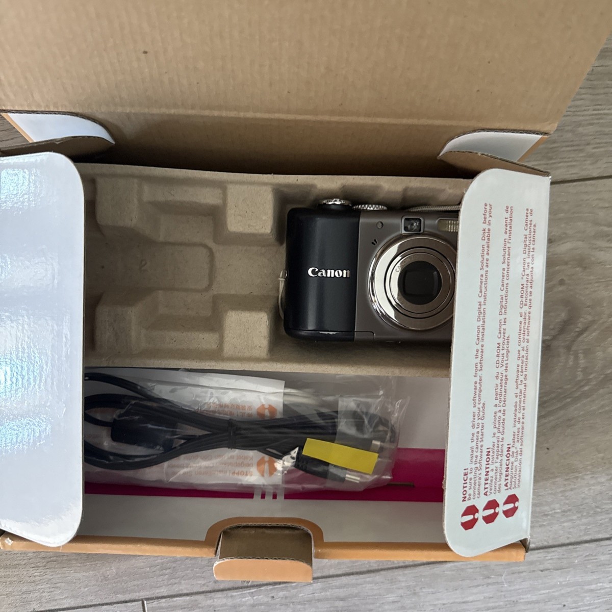 Canon PowerShot A1000 IS 10.0MP Digital Camera - Gray for
