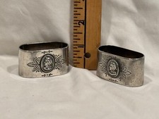 Pair 1870s Medallion Silver plated napkin rings