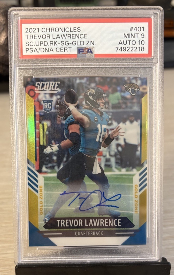 2021 Chronicles - Score Update Trevor Lawrence RC Auto Gold Zn /50