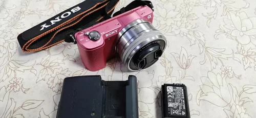 Sony Alpha a5000 Mirrorless camera pink 16-50mm Lens