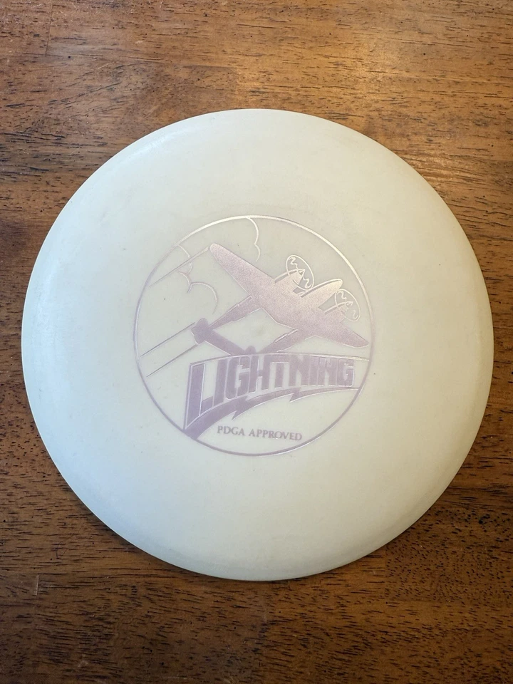 Lightning Disc Golf P-38 Stamp Glow White 170 grams disc golf - Image 2 of 4