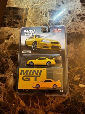 MINI GT 1:64 Nissan Skyline GT-R (R34) V-Spec Yellow miJo Exclusive Limited