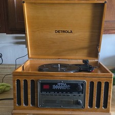 Detrola Turntable Record Player with CD, Cassette, and AM/FM Radio