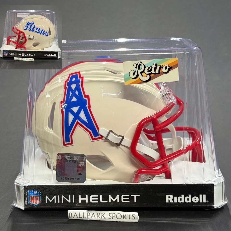 A brand-new Riddell mini helmet branded as the Oilers-era Titans — a rare dual-identity collectible that hardcore NFL history buffs will flip over.