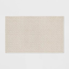 2'6"x3'10" Washable Solid Machine Tufted Accent Rug Tan - Threshold