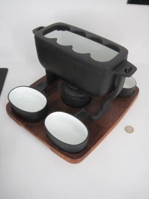 DIGSMED DANISH CAST IRON TEAK WOOD FONDUE SET WITH BURNER AND 4 INDIVIDUAL DISH
Opens in a new windo