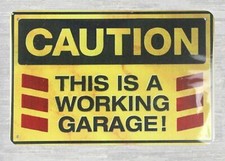 Caution this is a working garage tin metal sign buy art prints online