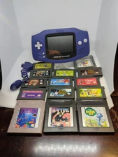 Nintendo Game Boy Advance, 14 Games,  Worm Light And Case Bundle.