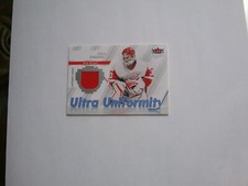 Chris Osgood Fleer Ultra- Ultra Uniformity jersey card #U-CO 2007/08