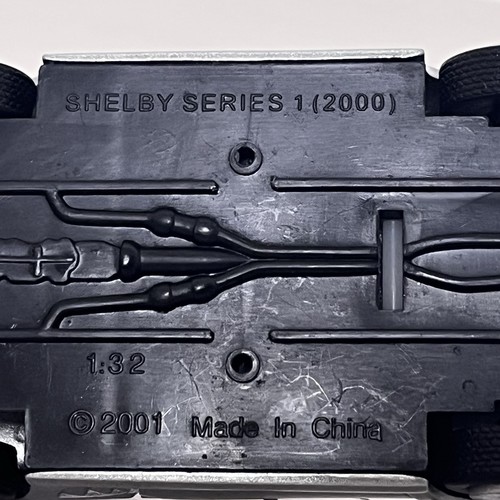 New Ray Silver Shelby Series 1 (2000) City Cruiser Diecast Car 1:32 Scale - Picture 19 of 21