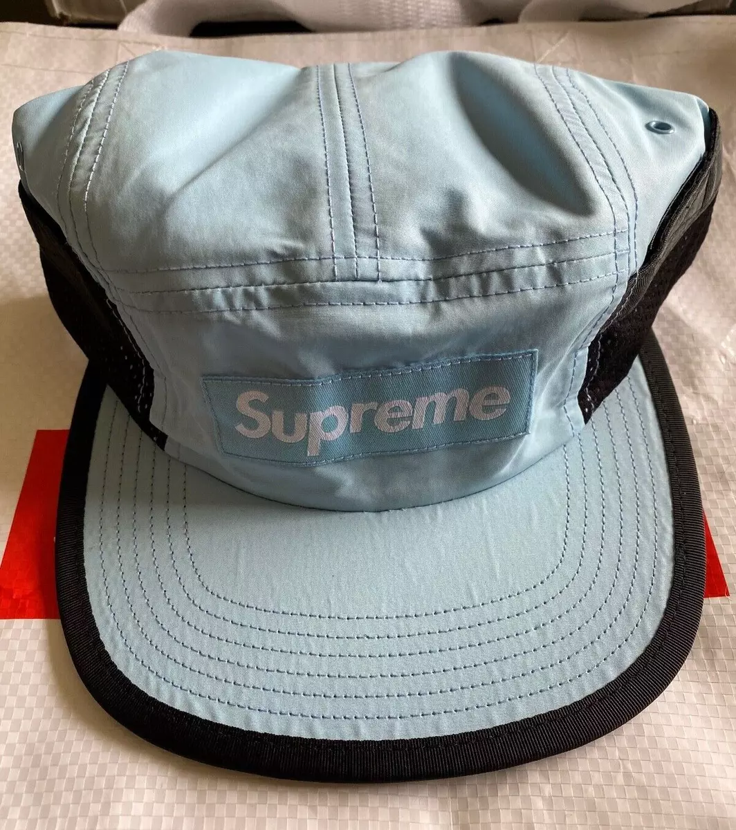 supreme camp cap on head