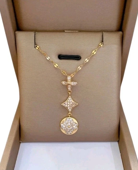 Collar con incrustaciones de diamantes de acero titanio geométrico minimalista trébol de flores triple Foto 2 de 4