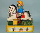 GALLOPING COWBOY SAVINGS BANK TIN BATTERY TOY JAPAN — photo 1