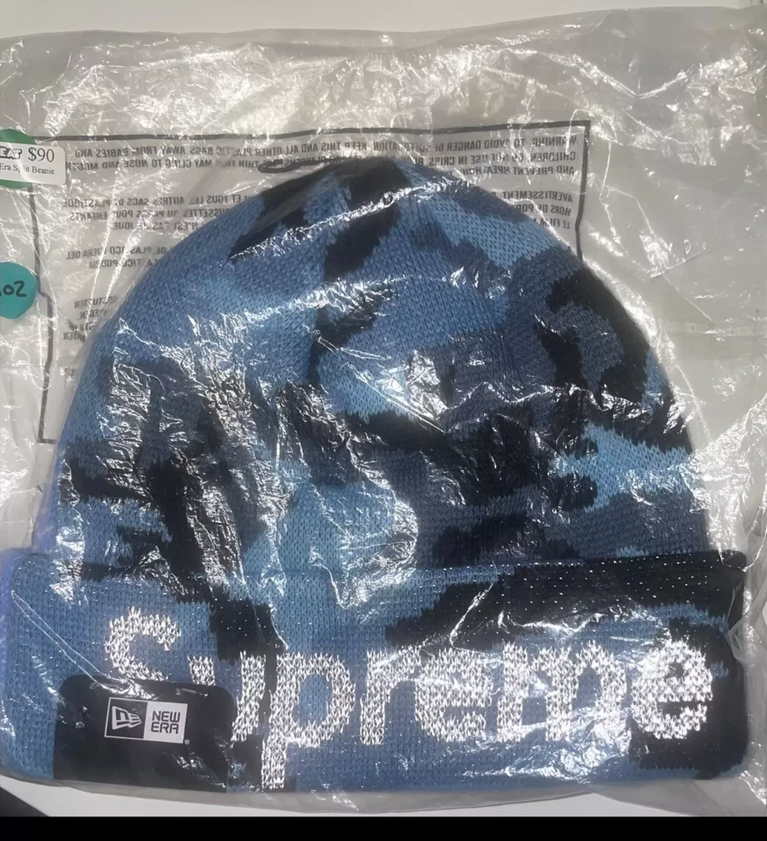 Chapeau Supreme x New Era Split Beanie bleu   Chapeau d'hiver