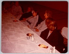 Vtg Color Snapshot Group Of Women In Striped Robes At Long Banquet Table 1977