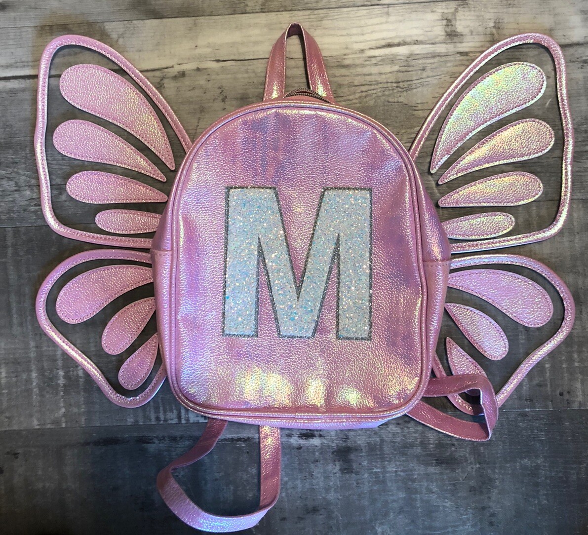 Justice Pink Metallic Initial Mini Butterfly Wing Backpack Letter