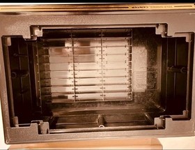 Atari 7800 console with 35 games, 2 controllers, power cord, storage case WORKS