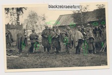 156- WK2 FOTO WH Soldaten in Zeltplanen gehüllt im Regen Kampfbereit