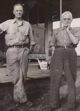 1930s Two Men Standing General Store Porch Seiberling Sign Glasses