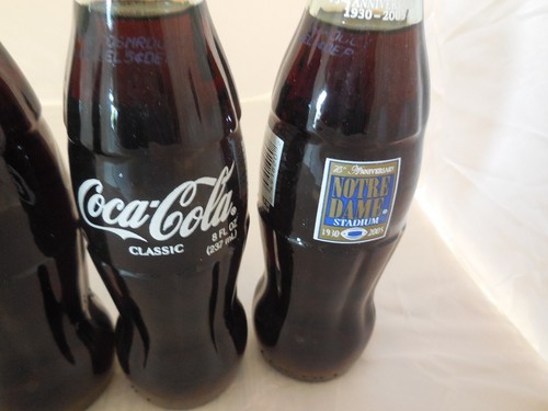Lot of 5 Coca Cola Coke Bottles Full 75th Anniversary 1930-2005 Notre Dame - Picture 4 of 10