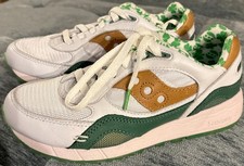 Saucony Shadow 6000 "Shamrock" sneakers in a white and green colorway. Size 7