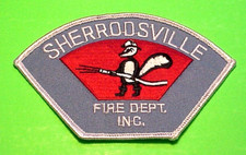 SHERRODSVILLE OHIO ( SKUNK HOLDING FIRE HOSE ) 2 7/8" x 4 1/2"  FIRE DEPT. PATCH