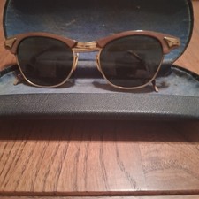 Hudson Optical browline sunglasses featuring a 1/10 12K Gold Filled bridge...