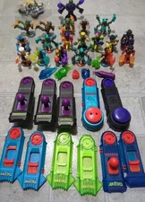 AKEDO Ultimate Arcade Warriors Mini Figurines Lot Of 38 Pieces  Moose Toys